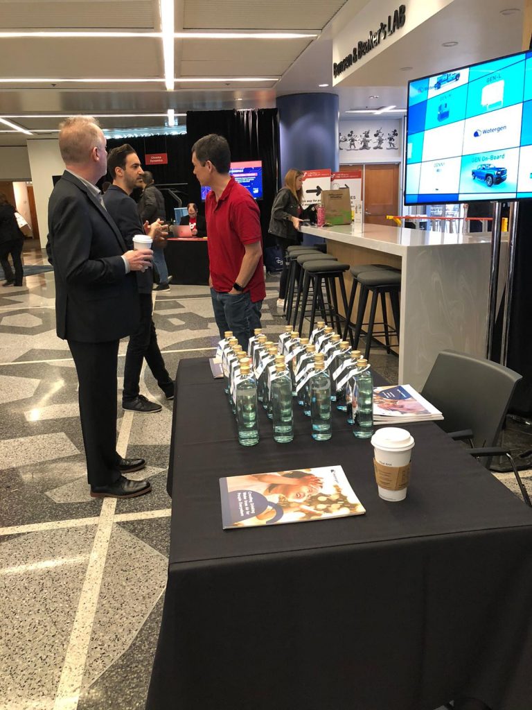 Bottles with water from air at the display